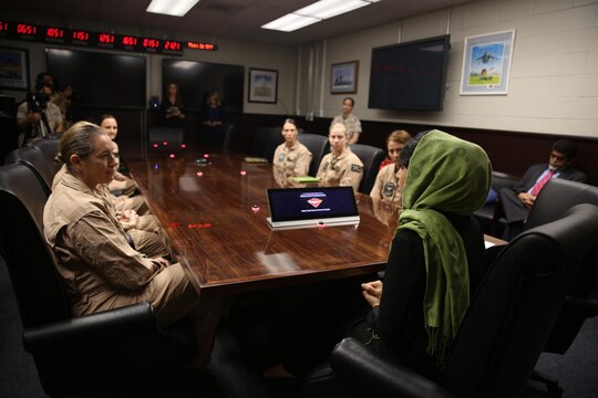 Captain Niloofar Rahmani, the first female fixed-wing pilot in the Afghan Air Force, speaks with female pilots who each fly different aircraft aboard Marine Corps Air Station Miramar, Calif., March 9. Rahmani received the 2015 International Women of Courage award by the Department of State for her courage in advocating women’s rights despite personal risk.