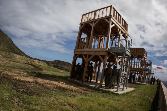 Marines with 2nd Battalion, 3rd Marine Regiment and soldiers with 563rd Engineer Company, 84th Engineer Battalion, Schofield Barracks test out Bluff Battery, a new urban terrain, unknown-distance range equipped with 20 static and 13 moving targets, March 5, 2015. The new range is comprised of three wooden structures that are three stories tall. The range creates a realistic urban terrain-training environment. (U.S. Marine Corps photo by Lance Cpl. Brittney Vella/Released)