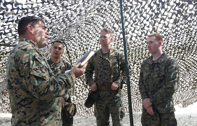 Navy Lt. Stephen Zachary, the chaplain for 1st Maintenance Battalion, Combat Logistics Regiment 15, 1st Marine Logistics Group, gives a sermon to Marines with 1st Maintenance Bn., during the I Marine Expeditionary Force Exercise aboard Camp Pendleton, Calif., Feb. 22, 2015. Zachary provided Marines and Sailors with a service during the training operation for spiritual support. (Marine Corps photo by Sgt. Cody Haas/ Released)