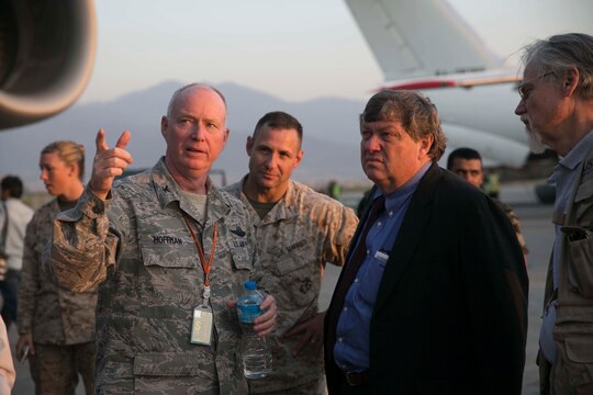 Lt. Col. Kenneth Hoffman, left, shows Peter W. Bodde the U.S. Air Force C-17 Globemaster III Aircraft as it arrives to Tribhuvan international airport May 5 to continue providing support for Nepal after the earthquake April 25. The 36th Contingency Response Group arrived with a 28-man team consisting of pilots, mechanics, medical personnel and other trained airmen in order to provide aid. The Nepalese Government requested the U.S. Government’s help after the earthquake. USAID is a U.S. Government agency that gives civilian foreign aid in time of natural disasters. Bodde is the United States Ambassador to Nepal. Hoffman is the joint liaison officer.