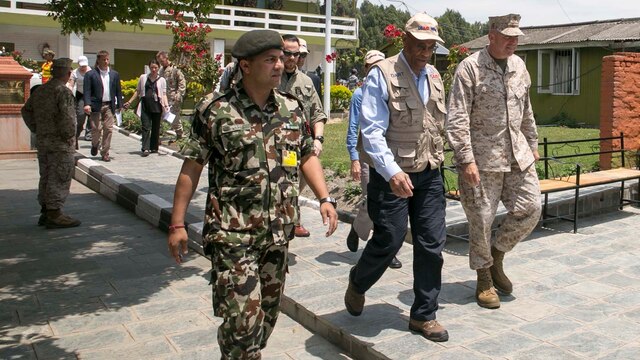 Lt. Gen. John E. Wissler meets with Alfonso Lenhardt and members of the United States Agency of International Development May 5 at Tribhuvan international airport before they depart to village Bhirkuna Deurali, Nepal. After Nepal was struck by a 7.8 magnitude earthquake Wissler and USAID members distribute supplies including tarps, sleeping systems and water purification solution. The Nepalese Government requested the U.S. Government’s help after the earthquake. USAID is a U.S. Government agency that gives civilian foreign aid in time of natural disasters. Wissler is the commanding general of III Marine Expeditionary Force. (U.S. Marine Corps photo by Cpl. Isaac Ibarra/Released)