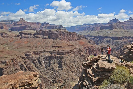 Marines take a scenic view of the Grand Canyon at a plateau during the Single Marine Program Grand Canyon Trip, May 16.The Single Marine Program offers trips to different recreational destinations such as Big Bear Lake, the Grand Canyon, Las Vegas and San Francisco. For more information on the available programs, please visit http://www.mccscp.com/smp
