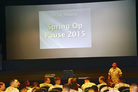 Master Sgt. Roberto Nolasco, operations chief, Military Operations and Training, Marine Corps Logistics Base Albany, discusses summer safety with Marines during the base's Spring Operational Pause, May 21, at the Base Theater.