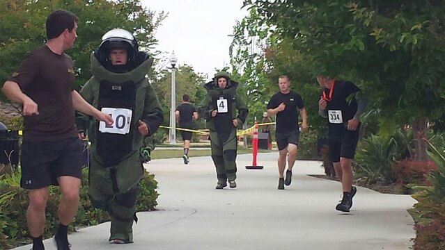 Camp Pendleton’s Base Explosive Ordnance Disposal Team and local communities took third place during the bon suit relay race as part of the third annual EOD Warrior 5K run in San Diego, May 25. The event was open to the public and was used to raise money for fallen and wounded EOD service members. 