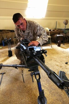 Pfc. Thomas Thompson, a machine gunner with Weapons Company, 3rd Battalion, 3rd Marine Regiment, and Willington, Mass., native, races to disassemble the MK19 machine gun during training exercise Lava Viper, one of the staples of their pre-deployment training, aboard Pohakuloa Training Area, Hawaii, Oct. 22, 2015. Lava Viper provides the Hawaii-based Marines with an opportunity to conduct various movements, live-fire and tactical training before departing for Integrated Training Exercise aboard Marine Air-Ground Combat Center Twentynine Palms, Calif., where the battalion will train and be evaluated as a whole. "Trinity" strives to fight and win on both the tactical and ethical battlefield, always cultivating the values of honor, courage, and commitment, ultimately producing morally guided citizens whose obligations and responsibilities supersede rights and privileges. (U.S. Marine Corps photo by Lance Cpl. Harley Thomas)