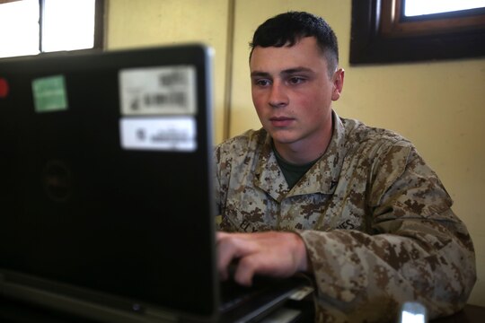 Lance Cpl. Brayden Ely, an administrative specialist with Headquarters and Service Company, 3rd Battalion, 3rd Marine Regiment, and Gillette, Wyo., native, creates a master roster for the battalion during training exercise Lava Viper, one of the staples of their pre-deployment training, aboard Pohakuloa Training Area, Hawaii, Oct. 22, 2015. Lava Viper provides the Hawaii-based Marines with an opportunity to conduct various movements, live-fire and tactical training before departing for Integrated Training Exercise aboard Marine Air-Ground Combat Center Twentynine Palms, Calif., where the battalion will train and be evaluated as a whole. "Trinity" strives to fight and win on both the tactical and ethical battlefield, always cultivating the values of honor, courage, and commitment, ultimately producing morally guided citizens whose obligations and responsibilities supersede rights and privileges. (U.S. Marine Corps photo by Lance Cpl. Harley Thomas)



