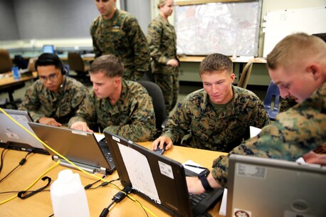 Marines with 1st Marine Division take part in a Combined Armed Staff Trainer exercise aboard Marine Corps Base Camp Pendleton, Calif., Nov. 17, 2015, in preparation for Exercise Steel Knight 2016. The CAST exercise was a division-level evolution, which allowed Marines to maintain designated skillsets in support of a simulated, large-scale operation.(U.S. Marine Corps photo by Cpl. Demetrius Morgan/RELEASED)
