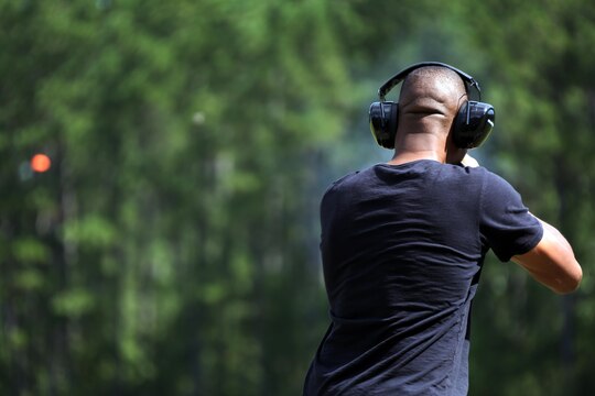 Staff Sgt. Jermaine Vereen fires his shotgun at a moving target during a skeet range at Marine Corps Air Station Cherry Point, N.C., Oct. 7, 2015. Marines with 2nd Low Altitude Air Defense Battalion held a weapons safety class and participated in the range as part of their Firearms Mentorship Program to promote proper weapons safety and education in a recreational manner. The program allows Marines to maintain their basic rifleman skills and receive further education on safety measures while handling weapons. Vereen is the Headquarters and Support battery gunnery sergeant with the battalion. (U.S. Marine Corps photo by Cpl. N.W. Huertas/Released)   