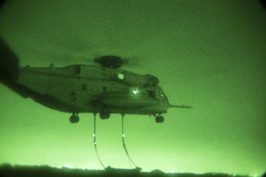 A CH-53E Super Stallion helicopter from Marine Medium Tiltrotor Squadron (VMM) 166 (Reinforced), 3rd Marine Aircraft Wing, prepares to lift a 6,200 pound steel girder during external lift training aboard Marine Corps Air Station Miramar, Calif., Oct. 14. The squadron conducted the training to maintain proficiency in transporting external cargo. (Official Marine Corps photo by Sgt. Brian Marion/Released)