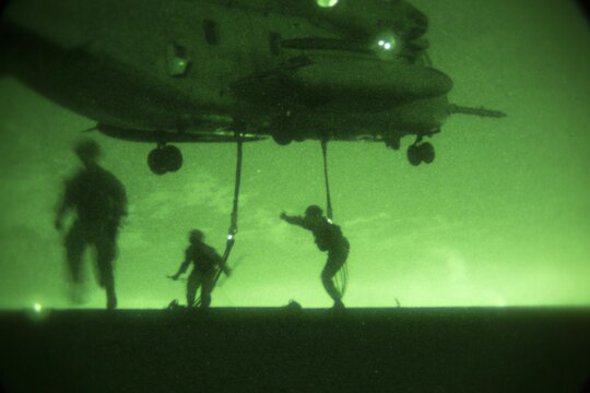 A CH-53E Super Stallion helicopter from Marine Medium Tiltrotor Squadron (VMM) 166 (Reinforced,) 3rd Marine Aircraft Wing, prepares to lift a 6,200 pound steel girder during external lift training aboard Marine Corps Air Station Miramar, Calif., Oct. 14. The squadron conducted the training to maintain proficiency in transporting external cargo. (Official Marine Corps photo by Sgt. Brian Marion/Released)