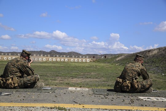 Recruits of Hotel Company, 2nd Recruit Training Battalion, aim in at the target in the sitting position during the rifle range at Edson Range, Marine Corps Base Camp Pendleton, Calif., Oct. 8. During rifle qualification, recruits fired the M16-A4 service rifle from the 200, 300 and 500-yard lines utilizing four different shooting positions: standing, kneeling, sitting and prone. Today, all males recruited from west of the Mississippi are trained at MCRD San Diego. The depot is responsible for training more than 16,000 recruits annually. Hotel Company will graduate Nov. 20.