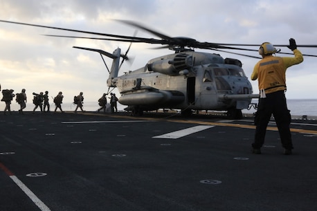 U.S. Marines with 5th Marine Regiment, 1st Marine Division board a CH-53E Super Stallion during Exercise Dawn Blitz, Sept. 5, 2015. Dawn Blitz 2015, a joint multinational amphibious exercise, promotes interoperability between the Navy, Marine Corps and Coalition partners. (U.S. Marine Corps photo by Lance Cpl. Eryn L. Edelman, 3D MAW Combat Camera/Released)