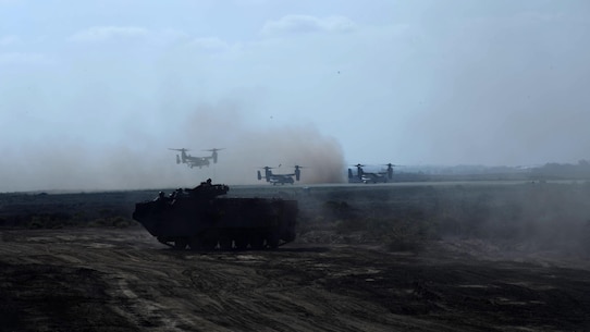 Marines with Alpha Company, 1st Battalion, 5th Marine Regiment provide security on the beach following an amphibious landing as part of Exercise Dawn Blitz 2015 at Marine Corps Base Camp Pendleton, Calif., Sept. 5, 2015. Dawn Blitz is a multinational, amphibious training exercise designed to hone the amphibious landing skills of I Marine Expeditionary Brigade, Expeditionary Strike Group Three and allies of the United States.