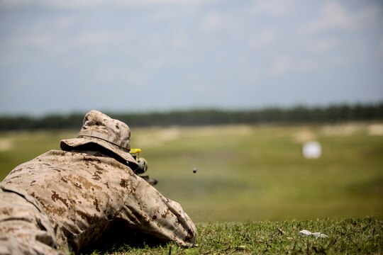 A Marine with Sniper Platoon, Weapons Company, 2nd Battalion, 6th Marine Regiment, fires on a target during a weapons zeroing range at G21, Camp Lejeune, N.C., Sept. 3, 2015. The sniper rifles used during the range included the M110 semi-automatic sniper rifle and M40 bolt-action sniper rifle. (U.S. Marine Corps photo by Cpl. Paul S. Martinez)