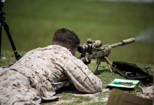 A Marine with Sniper Platoon, Weapons Company, 2nd Battalion, 6th Marine Regiment, fires on a target during a weapons zeroing range at G21, Camp Lejeune, N.C., Sept. 3, 2015. The sniper rifles used during the range included the M110 semi-automatic sniper rifle and M40 bolt-action sniper rifle. (U.S. Marine Corps photo by Cpl. Paul S. Martinez)