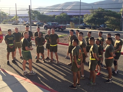 Camp San Mateo-Colonel K.R. Kassner, Commanding Officer of the Fighting Fifth Marine Regiment is addressing the group of selected Sergeants within the regiment upon completion of the Committed and Engaged Leaders Physical Training session.