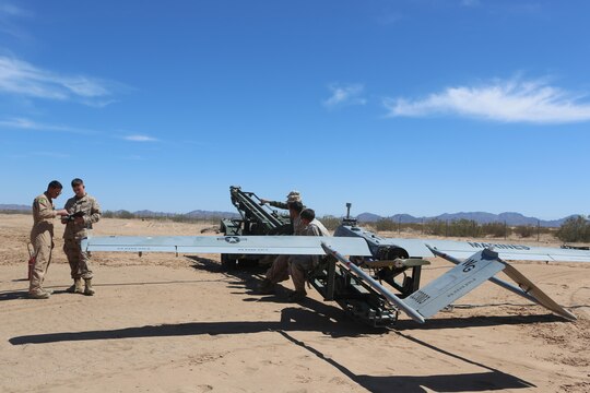 Marines with Marine Unmanned Aerial Vehicle Squadron (VMU) 1 perform function checks for the flight of the RQ-7Bv2 Shadow, an unmanned aerial system, at the Cannon Air Defense Complex in Yuma, Ariz., March 25. Marine Wing Support Squadron (MWSS) 371 and MWSS-274 supported VMU-1 by building a runway in preparation for the Shadow’s first flight at the site. (U.S. Marine Corps photo by Lance Cpl. Harley Robinson/Released)