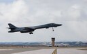 A B-1 bomber launches from the Ellsworth Air Force Base flightline to participate in the quarterly Large Force Exercise in the Powder River Training Complex March 30-31, 2016. The exercise included 17 aircraft and allowed B-1 bomber aircrews to train alongside other platforms to provide a realistic perspective of how to conduct multi-aircraft operations. (U.S. Air Force photo by Airman 1st Class Sadie Colbert/Released)