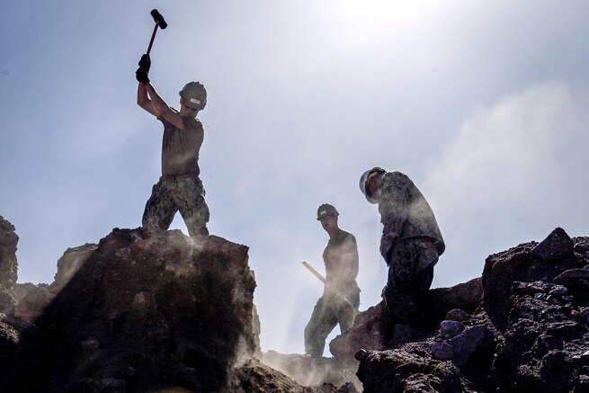 Sailors clear a path to a fighting position on Camp Badger during International Mine Countermeasures Exercise 2016 in Aqaba, Jordan, April 3, 2016. The Navy led the multilateral exercise, which is the world’s largest maritime exercise with forces from more than 30 nations training across the Middle East. Navy photo by Petty Officer 2nd Class Sean Furey