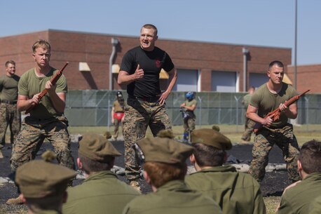 Staff Sgt. Chase Carson, a Martial Arts Instructor Trainer with Combat Logistics Battalion 6, 2nd Marine Logistics Group, showcases different Marine Corps Martial Arts Program techniques to Canadian cadets at Camp Lejeune, N.C., March 16, 2016. A total of 46 cadets with the Argyll and Sutherland Highlanders of Canada Regimental Cadet Corps visited the base and multiple units as part of an educational tour to gain understand how foreign militaries function.