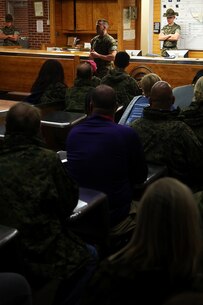 Capt. Timothy Peltz, Company Commander of Recruit Processing Company, speaks with educators from the greater Montgomery and Jacksonville areas about the beginning of recruit training aboard Marine Corps Recruit Depot Parris Island, S.C., April 13, 2016. The teachers, coaches, and principals of Recruiting Stations Jacksonville and Montgomery participate in a three-day workshop designed to inform educators about military service and life in the Marine Corps. (Official Marine Corps photo Cpl. John-Paul Imbody)