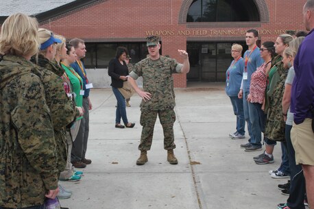 MGySgt Robert W. Haywood, Jr., speaks with the educators about the recruits they are about to meet and have lunch with April 13, 2016, at Weapons and Field Training Battalion Messhall aboard Marine Corps Recruit Depot Parris Island, S.C. As a part of the three-day workshop on Parris Island; counselors, teachers, and coaches are getting a taste of what it is to be a recruit as well as ask questions to better inform their students of opportunities in the Marine Corps. The educators are from Recruiting Stations Jacksonville and Montgomery areas. (Official Marine Corps photo by Cpl. Diamond N. Peden/Released)
