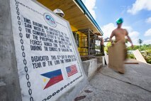 Australian Army Sapper Chad Holne, a Carpenter from 21 Construction Squadron, 6th Engineer Support Regiment carries materials for reparing a damaged school building during Exercise Balikatan 2016.
