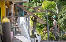 Australian, United States and Philippine forces work together to repair a damaged school classroom during Exercise Balikatan 2016. 