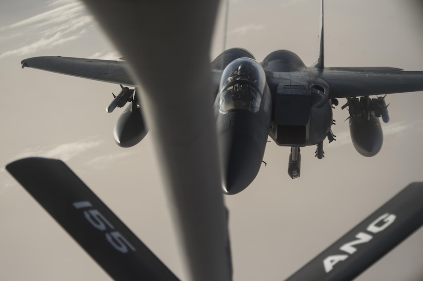 An Air Force F-15 Strike Eagle approaches a KC-135 Stratotanker for refueling over Iraq in support of Operation Inherent Resolve, the effort to counter the Islamic State of Iraq and the Levant in Iraq and Syria. Air Force photo by Staff Sgt. Corey Hook