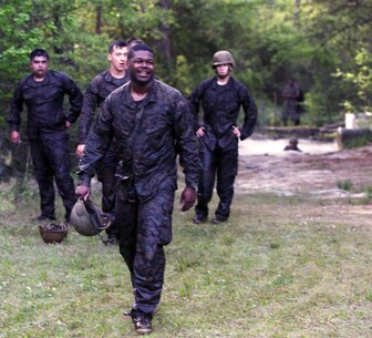 A group of Marines with Combat Logistics Regiment 2 completes an endurance course at Camp Lejeune, N.C., April 22, 2016. The unit pushed through the grueling 3.4 mile course to improve their ability to work as a team and to build camaraderie.