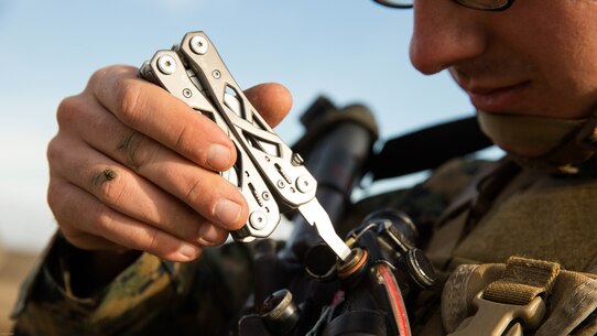 A U.S. Marine with Black Sea Rotational Force adjusts a rifle combat optic M4 after reviewing his shot group during a live-fire exercise aboard Mihail Kognalniceanu Air Base, Romania, Feb. 2, 2016. Marines from 1st Battalion, 8th Marine Regiment, conducted battle sight zeroes on various individual weapons systems, to prepare for future BSRF exercises and contingencies. 