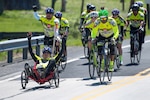 Retired Army Sgt. Albert Gonzalez sets pace for the Rescue 22 team during the Face of America bike ride in Gettysburg, Pa., April 24, 2016. More than 150 disabled veteran cyclists were paired amongst 600 able-bodied cyclists to ride 110 miles from Arlington, Va., to Gettysburg over two days in honor of veterans and military members. DoD photo by EJ Hersom
