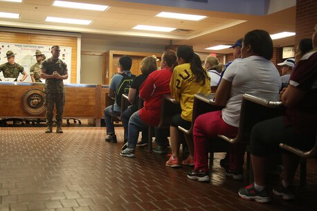Capt. Timothy Peltz, the company commander for Recruit Processing Company, speaks with the educators from the greater Nashville and Baton Rouge Areas aboard Marine Corps Recruit Depot Parris Island, S.C., April 27, 2016. The teachers, coaches, and principals of Recruiting Stations Baton Rouge and Nashville participate in a three-day workshop designed to inform educators about military service and life in the Marine Corps. (Official Marine Corps photo Cpl. John-Paul Imbody)