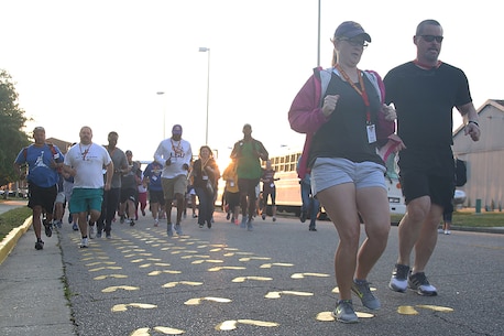 Educators from the greater Baton Rouge area run to the yellow footprints aboard Marine Corps Recruit Depot Parris Island, S.C., April 27, 2016. The teachers, coaches, and principals of Recruiting Stations Baton Rouge and Nashville participate in a three-day workshop designed to inform educators about military service and life in the Marine Corps. (Official Marine Corps photo Cpl. John-Paul Imbody)