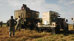A U.S. Air Force team sets up a mobile air traffic control tower at Eloy Alfaro International Airport in Manta, Ecuador, April 26, 2016. The portable tower will help local controllers increase the flow of humanitarian aid entering the country. The United States, in coordination with the Ecuadorian government, deployed 12 Air Force airmen to Ecuador to support international relief efforts for victims of a 7.8-magnitude earthquake. Photo courtesy of U.S. Embassy Quito