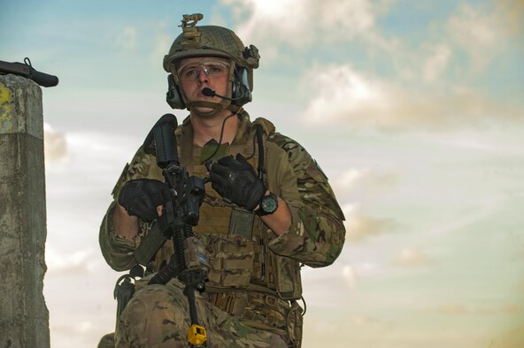 A deployed aircraft ground response element (DAGRE) Airman with the 353rd Special Operations Support Squadron, watches for potential threats while protecting a simulated airfield during an exercise at Kadena Air Base, Japan, July 27, 2016. DAGRE members are an elite security forces team who deploy with special operations groups to perform fly-away security, airfield security and personnel recovery operations. (U.S. Air Force photo by Airman 1st Class Corey M. Pettis)