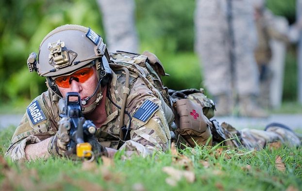A deployed aircraft ground response element (DAGRE) Airman with the 353rd Special Operations Support Squadron, watches for potential threats while protecting a simulated airfield during an exercise at Kadena Air Base, Japan, July 27, 2016. The DAGRE team is a special group of highly trained security forces Airmen that perform a wide range of special operations missions. (U.S. Air Force photo by Airman 1st Class Corey M. Pettis)   