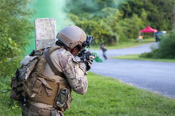 A deployed aircraft ground response element (DAGRE) Airman with the 353rd Special Operations Support Squadron, shoots blanks at an enemy target during an exercise at Kadena Air Base, Japan, July 27, 2016. The DAGRE team performs many special operations missions such as fly-away security, pararescue and combat control team escort, airfield security and personnel recovery operations. (U.S. Air Force photo by Airman 1st Class Corey M. Pettis) 