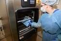 Senior Airman Emily Miller, 14th Medical Operations Squadron Dental Assistant, sends equipment through a machine to be sterilized July 26 at Columbus Air Force Base, Mississippi. The dental flight serves active-duty personnel from both the base and local area. (U.S. Air Force photo/Airman 1st Class John Day)