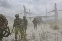 U.S. Marines assigned to Lima Company, 3rd Battalion, 3rd Marine Regiment and Philippine Marines exit an MV-22B Osprey at the Armed Forces of the Philippines Crow Valley training facility in support of Air Assault Support Exercise 16.2, August 6, 2016. The recurrence of the Air Assault Support Exercise each year demonstrates the U.S. and Republic of the Philippines’ commitment to mutual security.