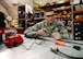 Staff Sgt. Taylor Elia, 379th Expeditionary Aircraft Maintenance Squadron communication navigation mission systems specialist, fixes a communication cord at the repair reference shop Aug. 12, 2016, at Al Udeid Air Base, Qatar. Airmen from the 379th EAMXS are responsible for ensuring the aircraft are maintained to exact standards to support Operation Inherent Resolve and Operations Freedom’s Sentinel. (U.S. Air Force photo/Senior Airman Janelle Patiño/Released)