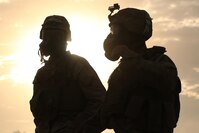 Marines with 1st Battalion, 1st Marine Regiment, stand on the firing line after a live fire range August 18, 2016, at Bradshaw Field Training Area, Northern Territory, Australia. The range was the final training evolution of Exercise Koolendong 16, a trilateral exercise between the U.S. Marine Corps, Australian Defence Force and French Armed Forces New Caledonia. Marines held a defensive position while engaging targets and working through the CS gas, which simulated a chemical attack. 