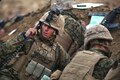 A Marine talks on the radio during Exercise Koolendong 16 at Bradshaw Field Training Area, Northern Territory, Australia, Aug. 18, 2016. The Marines are assigned to 1st Battalion, 1st Marine Regiment. Exercise Koolendong 16 included close-air support, mortars, sniper overwatch and a combined anti-armor team. Marine Corps photo by Sgt. Sarah Anderson