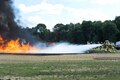 Air Force Reserve firefighters extinguish a fuel fire in a burn pit during Exercise Patriot Warrior 2016 at the airport at Fort McCoy, Wis., Aug. 18, 2016. Air Force photo by Tech. Sgt. Nathan Rivard