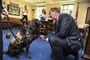 Defense Secretary Ash Carter shakes hands with Pvt. Truman, a working dog assigned to Walter Reed National Military Medical Center in Bethesda, Md., at the Pentagon, Aug. 26, 2016, to recognize National Dog Day. DoD photo by Navy Petty Officer 1st Class Tim D. Godbee