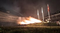 U.S. Marines with Marine Barracks Washington fire the cannons during the evening parade at Marine Barracks Washington, Washington, D.C., August 26, 2016. Commandant of the Marine Corps Gen. Robert B. Neller hosted the parade and Secretary of Defense Ashton B. Carter was the guest of honor. 
