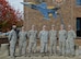 U.S. Airmen assigned to the 20th Operations Support Squadron aircrew flight equipment team are recognized by Col. Daniel Lasica, 20th Fighter Wing commander, left, and Chief Master Sgt. Christopher McKinney, 20th FW command chief, right, during an Airman Up! presentation at Shaw Air Force Base, S.C., Nov. 30, 2016. The Airmen were recognized for demonstrating perseverance, resiliency and dedication to excellence during a unit effectiveness inspection earlier this year. (U.S. Air Force photo by Airman 1st Class BrieAnna Stillman)