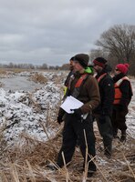 USACE Buffalo District project managers Chris Akios, Sheila Hint, and Joshua Unghire inspect newly formed channels at the Braddock Bay Wildlife Management Area, Greece, NY. 