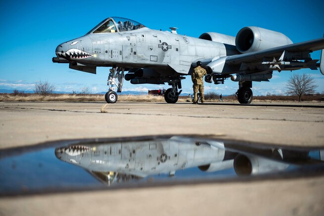 An airman refuels an A-10C Thunderbolt II during training in Plovdiv, Bulgaria, Feb. 11, 2016. The aircraft belongs to the 74th Expeditionary Fighter Squadron. Air Force photo by Airman 1st Class Luke Kitterman