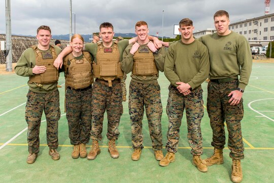 Marines with the provost marshal’s office K-9 unit pose for a picture after winning the Frozen Chosin Competition at Marine Corps Air Station Iwakuni, Japan, Feb. 25, 2016. Teams consisting of six members completed a series of events including a pull up and sit up contest, a 5k supply run, a 600 meter swim, 250 meter sprint then constructing and presenting professional military education. The winner of the event will either take a trip to Iwo Jima or the demilitarized zone, a strip of land running across the Korean Peninsula that serves as a buffer zone between North and South Korea. Crossing the 38th parallel, the DMZ cuts Korea in half and is the most heavily armed border in the world.